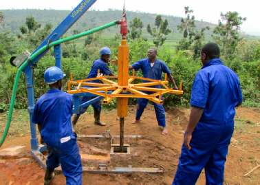 BMS volunteers drilling a well in Africa
